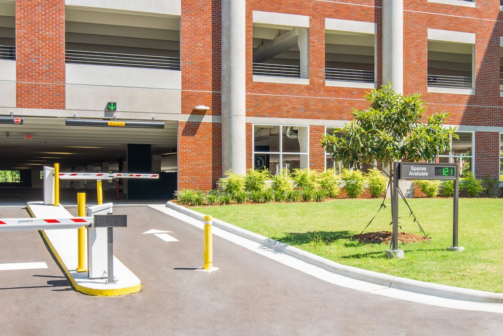 Entrance of Central Parking Deck showing access control and spaces available sign