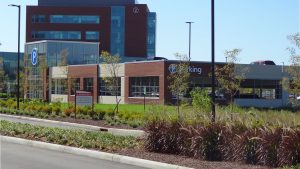 Parking structure at Mount Carmel Grove City with hospital in background