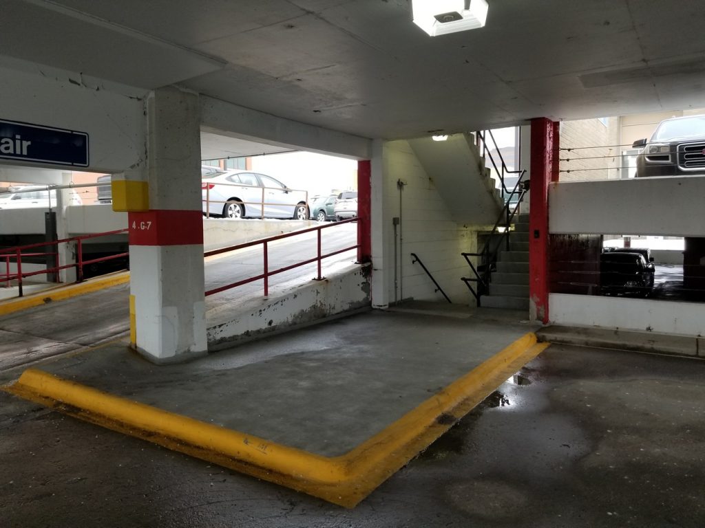 Interior of garage showing deterioration before restoration