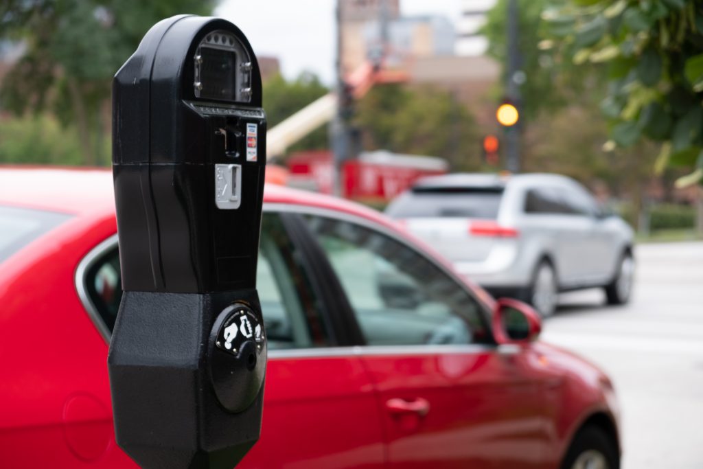 Parking meter near a busy street